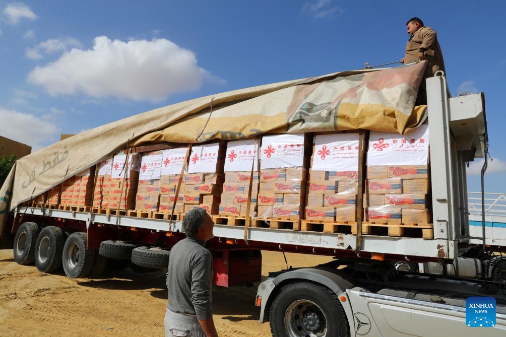 A truck loaded with humanitarian aid supplies to Gaza provided by the Chinese government waits for departure in Cairo, Egypt, Nov. 27, 2023. The ambassador of Palestine to Egypt has extended his country's sincere gratitude to the Chinese government and people for providing timely humanitarian aid supplies to the conflict-ridden Gaza Strip.(Photo: Xinhua)