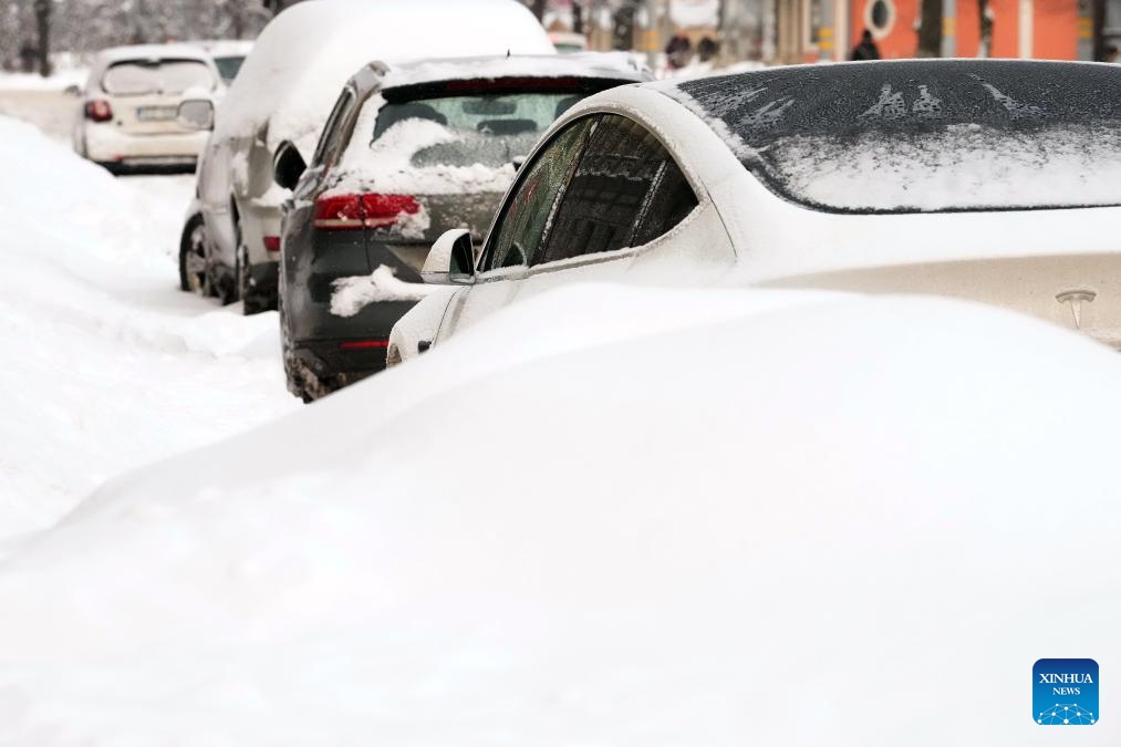 Cars covered with snow are pictured in Riga, Latvia, Nov. 30, 2023.(Photo: Xinhua)