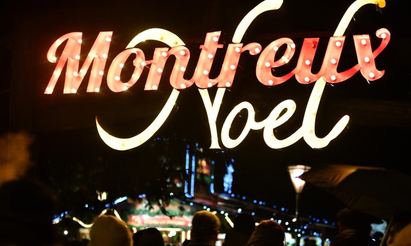 People visit the lakeside Christmas market in Montreux, Switzerland, Dec. 2, 2023. The lakeside Christmas market in Montreux is one of the most famous of its kind in the country. (Photo: Xinhua)