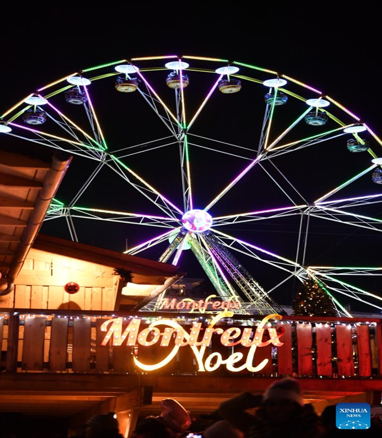 This photo taken on Dec. 2, 2023 shows a view of the lakeside Christmas market in Montreux, Switzerland. The lakeside Christmas market in Montreux is one of the most famous of its kind in the country. (Photo: Xinhua)