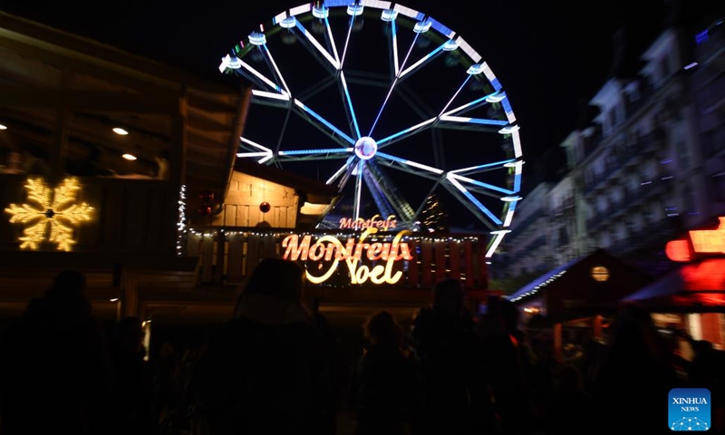 This photo taken on Dec. 2, 2023 shows a view of the lakeside Christmas market in Montreux, Switzerland. The lakeside Christmas market in Montreux is one of the most famous of its kind in the country. (Photo: Xinhua)