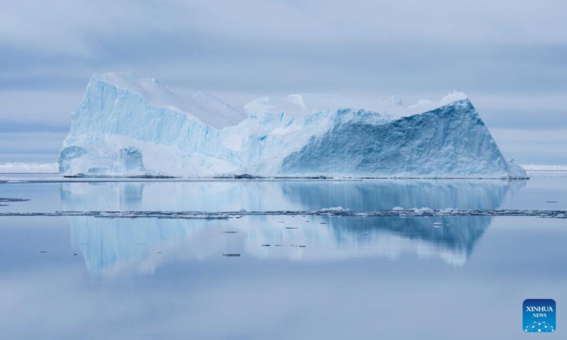 An iceberg is pictured near China's research icebreaker Xuelong 2, Dec. 3, 2023. China's research icebreaker Xuelong 2 and its companion cargo vessel Tian Hui are now sailing through ice floes. (Photo: Xinhua)