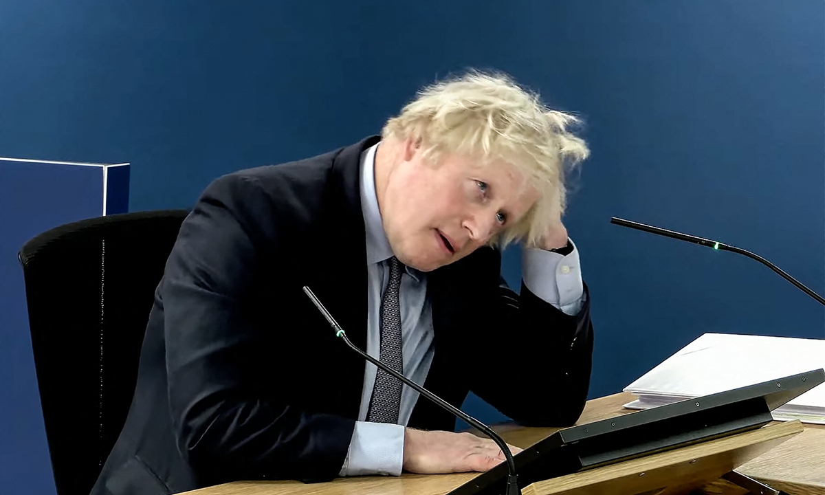 A screen grab shows Britain's former prime minister Boris Johnson speaking at the UK COVID-19 Inquiry, in London, on December 6, 2023. Johnson gave his most explicit apology for his handling of the COVID crisis, saying his administration had been too complacent and initially underestimated the risks posed by the virus. Photo: VCG