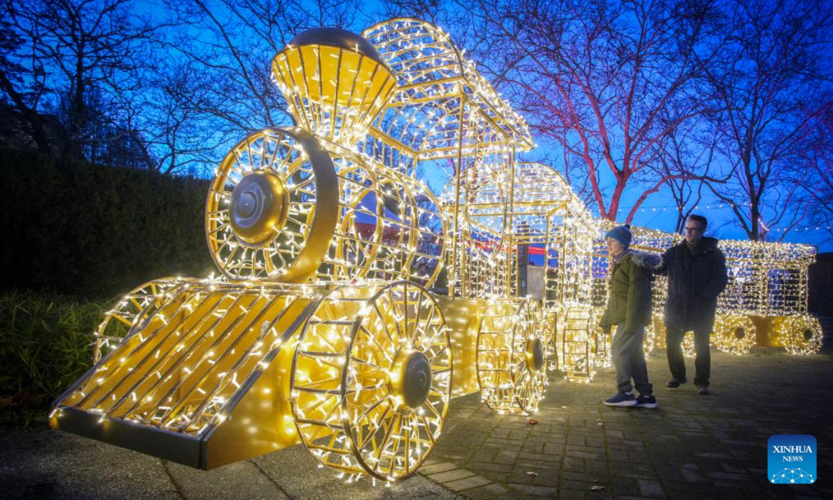 People look at a light installation at the PNE Winter Fair at the Pacific National Exhibition in Vancouver, British Columbia, Canada, Dec. 8, 2023. Photo:Xinhua