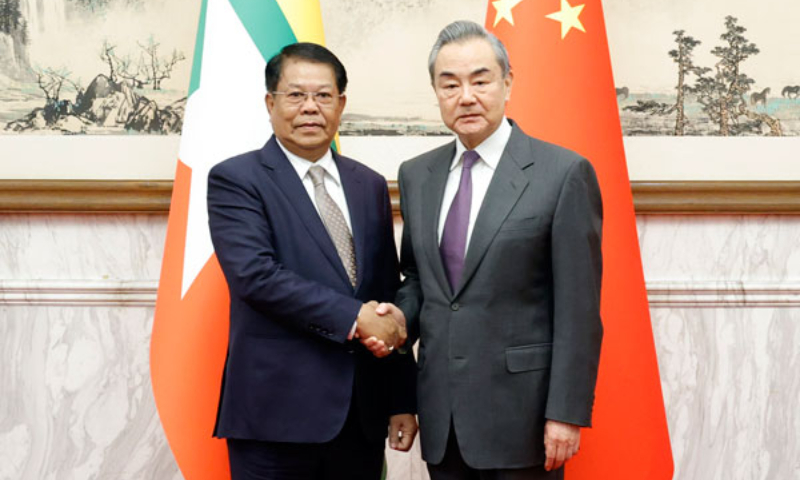 Chinese Foreign Minister Wang Yi (right) meets with Myanmar's Deputy Prime Minister and Union Minister for Foreign Affairs U Than Swe on Wednesday. Photo: fmprc.gov.cn