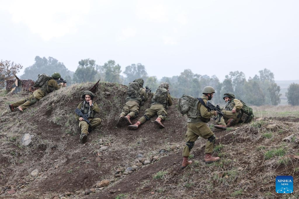 Israeli soldiers take part in a military drill in the Golan Heights, Dec. 6, 2023.(Photo: Xinhua)