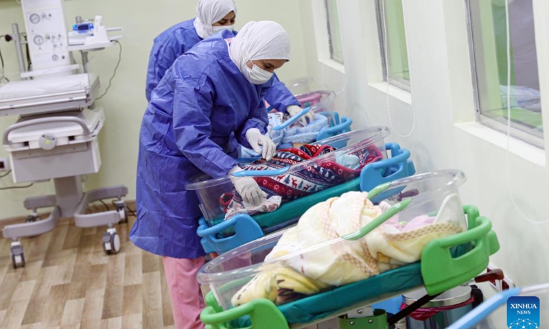 Medical workers take care of premature babies from Gaza Strip at a hospital in the new administrative capital, east of Cairo, Egypt, Dec. 3, 2023. Egypt received 28 premature babies from Al-Shifa, Gaza's largest hospital, via Rafah crossing, the only crossing point between the besieged Gaza Strip and Egypt on Nov. 20. Currently many of these babies are being treated at a hospital in the new administrative capital of Egypt. (Photo: Xinhua)