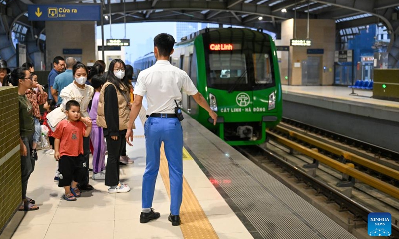 People wait for a train of the Cat Linh-Ha Dong urban elevated railway in Hanoi, Vietnam, Dec. 9, 2023. The Cat Linh-Ha Dong urban elevated railway was built by the China Railway Sixth Group as an important project of the synergy of China's Belt and Road Initiative with Vietnam's Two Corridors and One Economic Circle plan. (Photo: Xinhua)