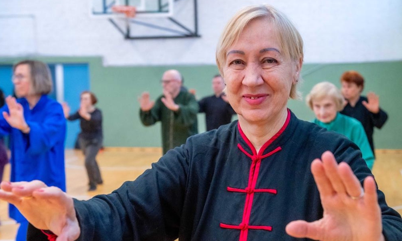 Participants perform at the Chinese Wushu (Kung Fu) and Tai Chi Performance Competition held by Lithuanian Wushu Federation in Vilnius, Lithuania, Dec. 9, 2023. (Photo: Xinhua)