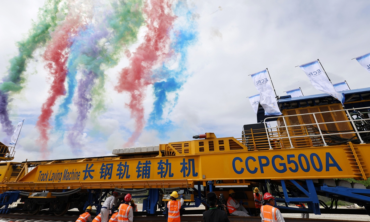 Construction workers install the first track for the East Coast Rail Link project in Pahang state, Malaysia, on December 11, 2023. Construction of the 665-kilometer rail link, a key project under China-proposed Belt and Road Initiative, is using high-tech technologies including state-of-the-art Chinese-made tunnel boring machines, which are used to excavate some of the longest tunnels in the region. Photo: Xinhua