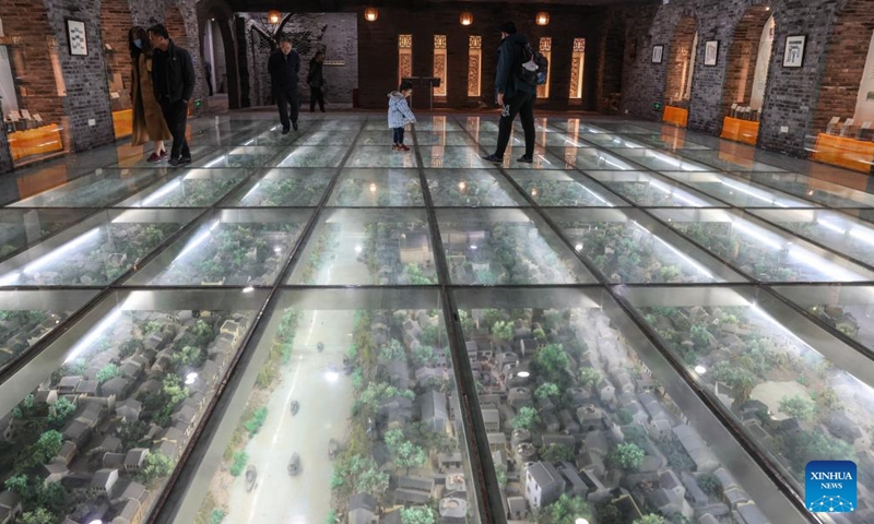 People visit a museum at a historical and cultural district along the Grand Canal in Wuxi, east China's Jiangsu Province, Dec. 7, 2023. (Photo: Xinhua)