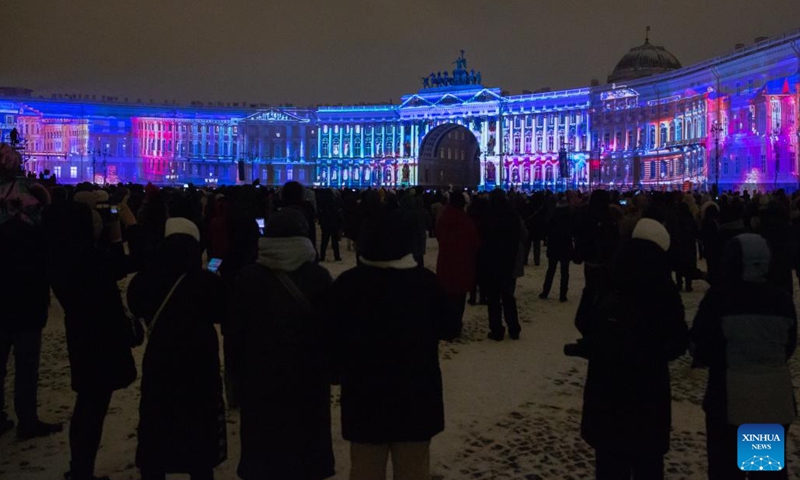 People watch a light show at the Palace Square in St. Petersburg, Russia, on Dec. 9, 2023. The light show was held Saturday to mark the 259th anniversary of the State Hermitage Museum. (Photo: Xinhua)