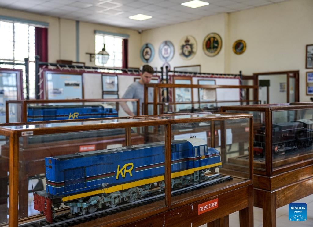 A visitor views exhibits at the Nairobi Railway Museum in Nairobi, Kenya, on Nov. 27, 2023. The Nairobi Railway Museum, nestled in Nairobi's bustling downtown, remains a popular destination for both locals and tourists eager to delve into Kenya's rich history.(Photo: Xinhua)