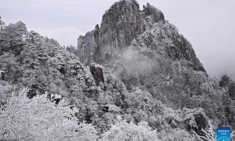 This photo taken on Dec. 16, 2023 shows the snow scenery at the Huangshan Mountain scenic area in Huangshan City, east China's Anhui Province. The scenic area witnessed the first snowfall in this winter recently. (Xinhua/Zhou Mu)