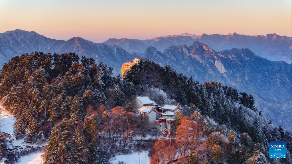 This aerial photo taken on Dec. 12, 2023 shows the snow scenery of Huashan Mountain in Weinan, northwest China's Shaanxi Province.(Photo: Xinhua)