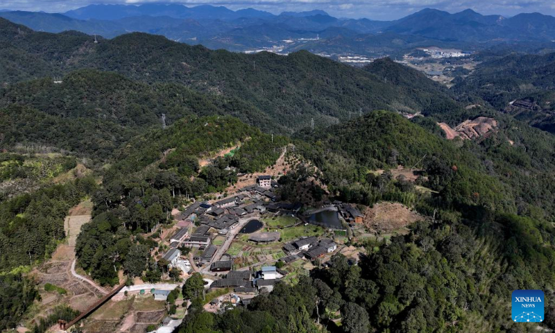 This aerial photo taken on Dec. 15, 2023 shows a view of Xiaojiashan Village in Sanming City, southeast China's Fujian Province. (Xinhua/Wei Peiquan)