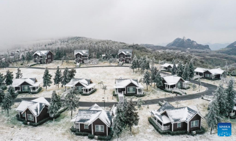 This aerial photo taken on Dec. 16, 2023 shows the snow scenery at the Chuanhegai scenic spot in Yongdong Town, Xiushan Tujia and Miao Autonomous County in Chongqing, southwest China. (Xinhua/Wang Quanchao)