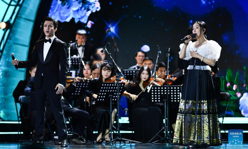 Actors perform during the opening ceremony of the 5th Hainan Island International Film Festival in Sanya, south China's Hainan Province, Dec. 16, 2023. The festival runs from Dec. 16 to 22. (Xinhua/Fan Yuqing)