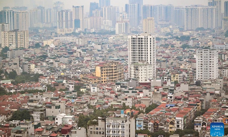 This photo taken on Dec. 9, 2023 shows a view of Hanoi, capital of Vietnam. The Vietnamese capital city of Hanoi, located on the Red River Delta, is an ancient city with a history of more than a thousand years. With natural scenery and subtropical city view, it draws lots of visitors from home and abroad.(Photo: Xinhua)