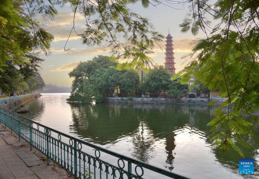 This photo taken on Oct. 1, 2018 shows the scenery of the West Lake in Hanoi, capital of Vietnam. The Vietnamese capital city of Hanoi, located on the Red River Delta, is an ancient city with a history of more than a thousand years. With natural scenery and subtropical city view, it draws lots of visitors from home and abroad. (Photo: Xinhua)