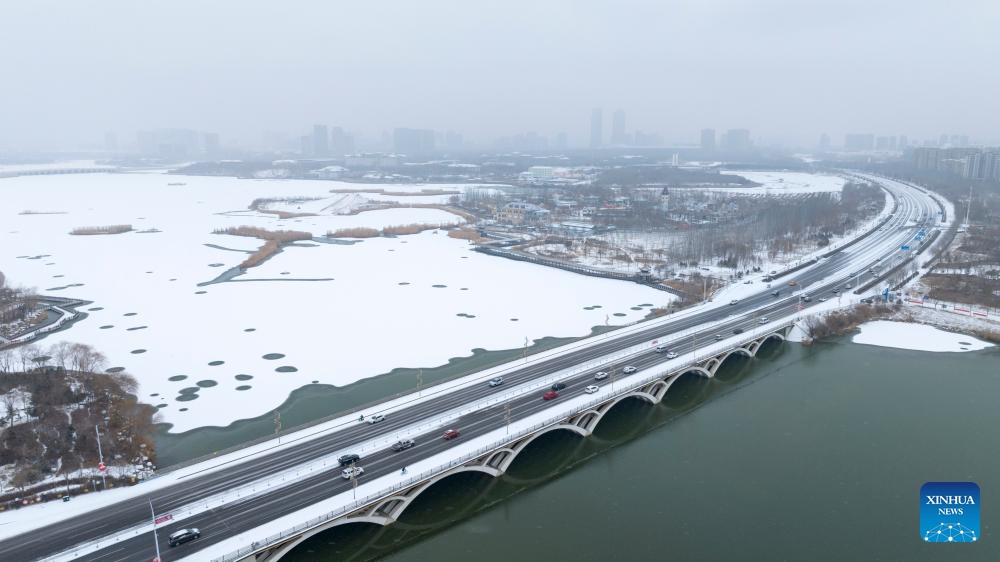 This aerial photo taken on Dec. 14, 2023 shows the snow scenery in Yinchuan, northwest China's Ningxia Hui Autonomous Region.(Photo: Xinhua)