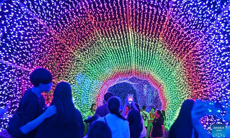 People view light installations for Christmas at Singapore's Gardens by the Bay on Dec. 18, 2023.(Photo: Xinhua)