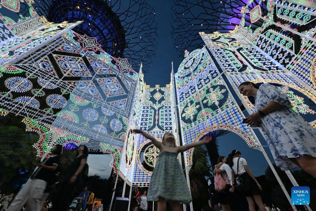 People view light installations for Christmas at Singapore's Gardens by the Bay on Dec. 18, 2023.(Photo: Xinhua)