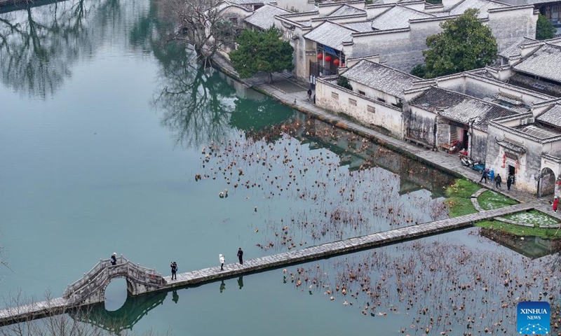 This aerial photo taken on Dec. 19, 2023 shows the snow scenery in Hongcun Village of Huangshan, east China's Anhui Province.（Photo: Xinhua)