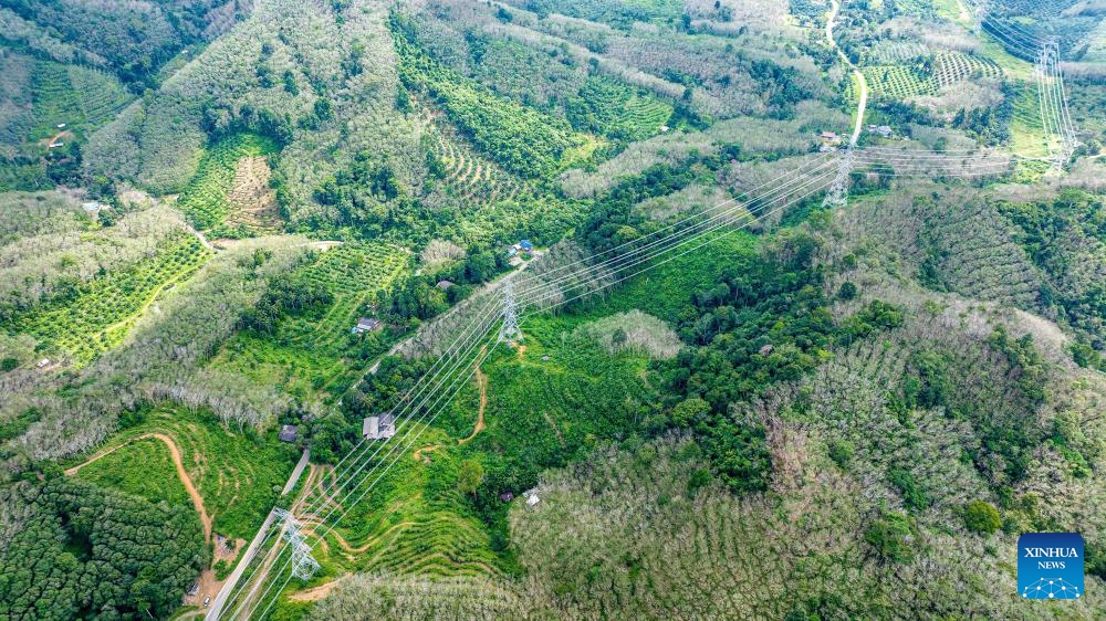 This aerial photo taken on Dec. 19, 2023 shows a view of the China-built Thung Song-Songkhla 500kV Transmission Line Project in Nakhon Si Thammarat, Thailand. A China-built power transmission line project was inaugurated on Tuesday in Thailand's southern Phatthalung province after two years of construction. The Thung Song-Songkhla 500kV Transmission Line Project, known as the Thung Song Project, is the first 500kV Transmission Line in southern Thailand.(Photo: Xinhua)