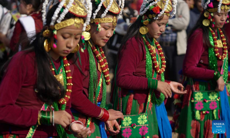 Girls in traditional attire from the Gurung community are pictured during the celebration of Tamu Lhosar festival to mark the commencement of Gurung new year in Kathmandu, Nepal, Dec. 31, 2023. (Photo by Hari Maharjan/Xinhua)