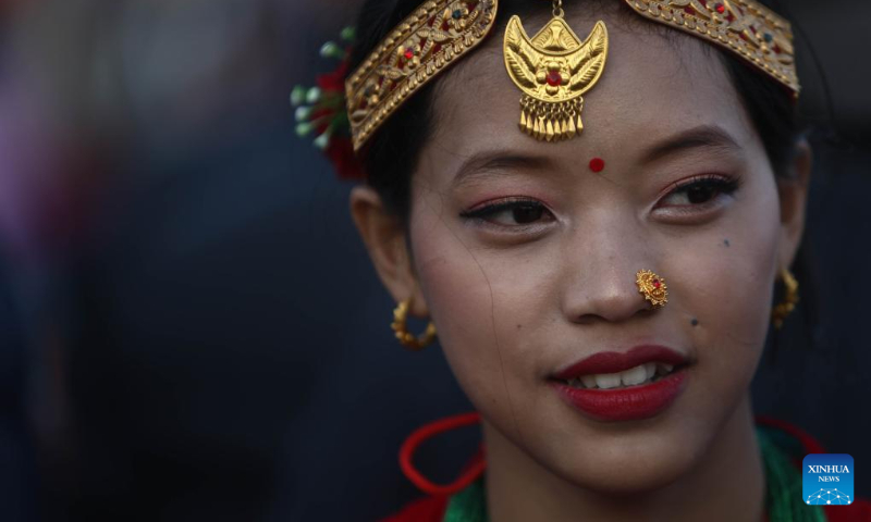 A girl in traditional attire from the Gurung community is pictured during the celebration of Tamu Lhosar festival to mark the commencement of Gurung new year in Kathmandu, Nepal, Dec. 31, 2023. (Photo by Sulav Shrestha/Xinhua)