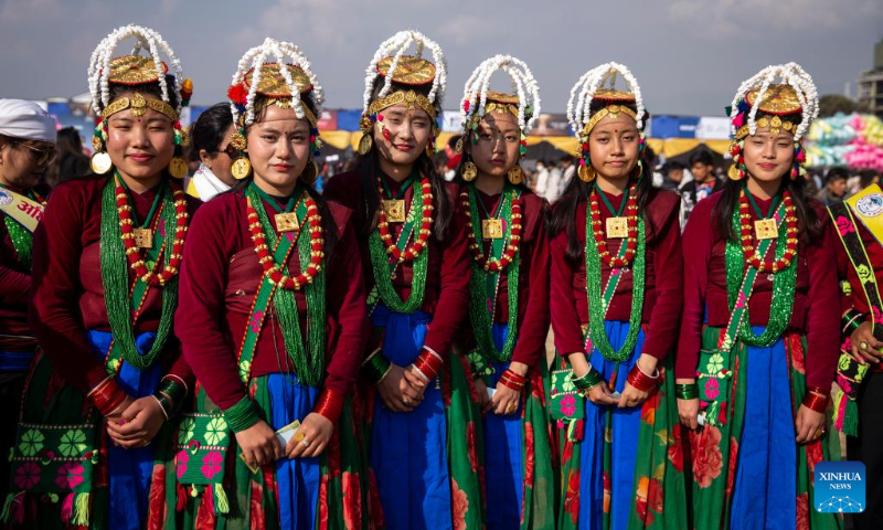 Girls in traditional attire from the Gurung community are pictured during the celebration of Tamu Lhosar festival to mark the commencement of Gurung new year in Kathmandu, Nepal, Dec. 31, 2023. (Photo by Hari Maharjan/Xinhua)