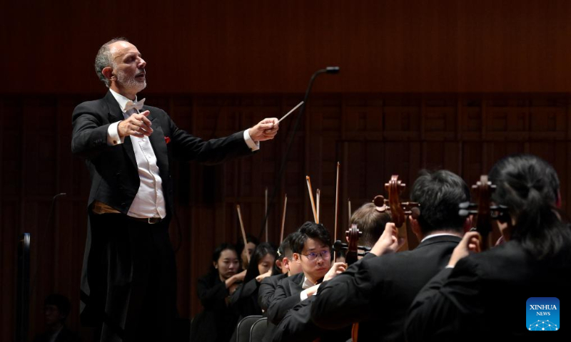 Italian conductor Massimiliano Stefanelli gestures during a New Year concert in Xi'an, northwest China's Shaanxi Province, Dec. 30, 2023. (Xinhua/Liu Xiao)