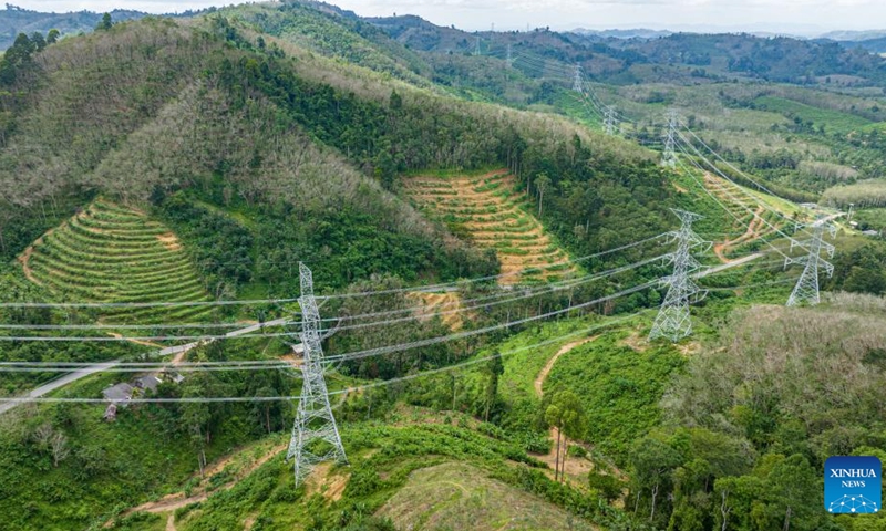 This aerial photo taken on Dec. 20, 2023 shows a view of the China-built Thung Song-Songkhla 500kV Transmission Line Project in Phatthalung, Thailand. A China-built power transmission line project was inaugurated on Tuesday in Thailand's southern Phatthalung province after two years of construction. The Thung Song-Songkhla 500kV Transmission Line Project, known as the Thung Song Project, is the first 500kV Transmission Line in southern Thailand.(Photo: Xinhua)