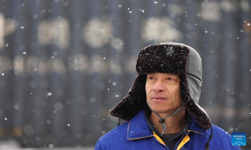 A man works at a multimodal international logistics port of the Xinjiang Production and Construction Corps in northwest China's Xinjiang Uygur Autonomous Region, Dec. 22, 2023. (Xinhua/Hu Huhu)