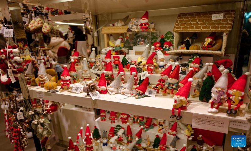 This photo taken on Dec. 24, 2023 shows Christmas-themed products in a mall in Ginza, Tokyo, Japan. (Xinhua/Zhang Xiaoyu)