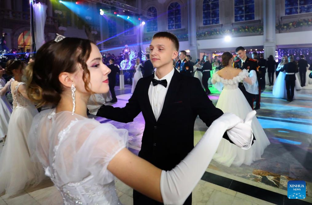 People dance at a ball to welcome the upcoming New Year in Minsk, capital of Belarus, on Dec. 26, 2023.(Photo: Xinhua)