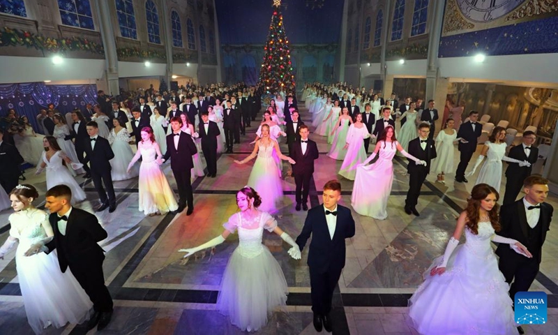 People dance at a ball to welcome the upcoming New Year in Minsk, capital of Belarus, on Dec. 26, 2023.(Photo: Xinhua)