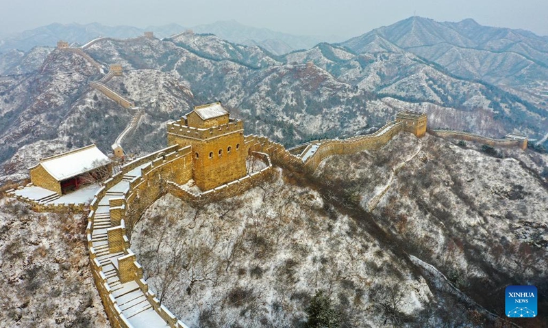 This aerial photo taken on Jan. 13, 2023 shows the winter scenery at the Jinshanling section of the Great Wall in Luanping County, north China's Hebei Province. With the change of the four seasons, the Jinshanling section of the Great Wall puts on different layers of colors and shows magnificent beauty.(Photo: Xinhua)