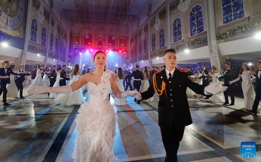 People dance at a ball to welcome the upcoming New Year in Minsk, capital of Belarus, on Dec. 26, 2023.(Photo: Xinhua)