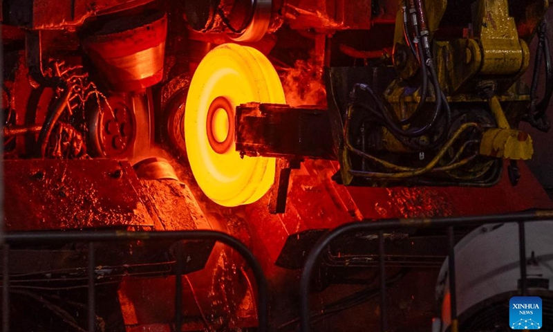 This photo taken on Dec. 15, 2023 shows a hot rolling production line in China Baowu Group Masteel Rail Transit Materials Technology Co., Ltd. (MRT) in Ma'anshan, east China's Anhui Province. (Photo: Xinhua)