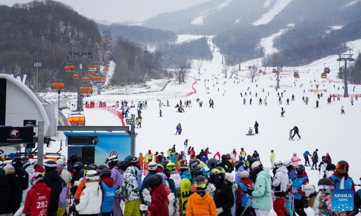 Tourists are seen at Lake Songhua Resort in Jilin City, northeast China's Jilin Province, Dec. 30, 2023. The three-day 2024 New Year holiday started on Saturday in China. (Photo: Xinhua)