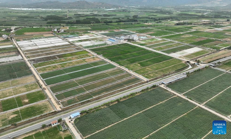 This aerial photo taken on Dec. 29, 2023 shows the national seed breeding base in Hainan at Sanya, south China's Hainan Province. Sanya's abundance of sunlight expedites the breeding cycle, drawing numerous researchers from across the country to breed new species of crops every October till the next April. (Photo: Xinhua)