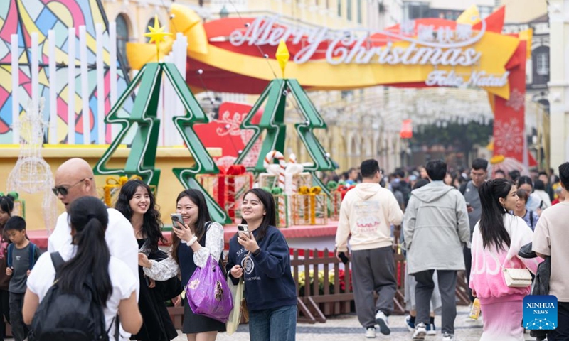 Tourists visit the Senado Square in south China's Macao, Dec. 31, 2023. (Photo:Xinhua)