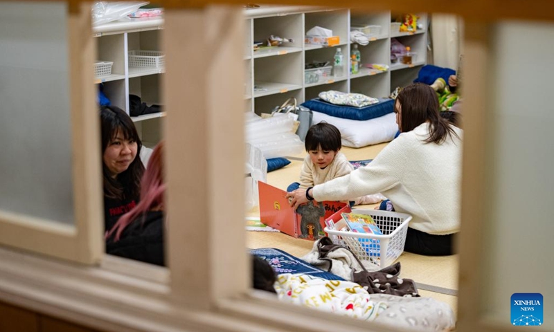 People take refuge at a primary school in Shika, Ishikawa prefecture, Japan, Jan. 2, 2024. The death toll has risen to 48 in the central Japanese prefecture of Ishikawa as of 3:30 p.m. local time after a series of powerful earthquakes hit the area in central Japan and the vicinity, national broadcaster NHK reported on Tuesday. Injuries are reported in the prefectures of Ishikawa, Niigata, Fukui, Toyama, and Gifu, it added. (Photo: Xinhua)