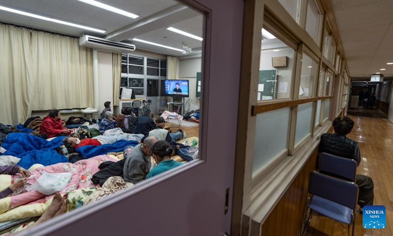 People take refuge at a primary school in Shika, Ishikawa prefecture, Japan, Jan. 2, 2024. The death toll has risen to 48 in the central Japanese prefecture of Ishikawa as of 3:30 p.m. local time after a series of powerful earthquakes hit the area in central Japan and the vicinity, national broadcaster NHK reported on Tuesday. Injuries are reported in the prefectures of Ishikawa, Niigata, Fukui, Toyama, and Gifu, it added. (Photo: Xinhua)