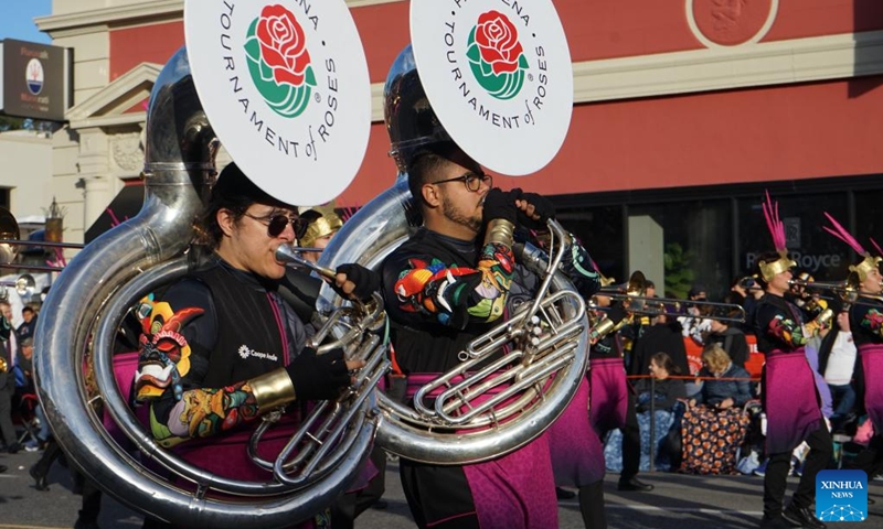 Members of a marching band perform along Colorado Boulevard in Pasadena, Southern California, the United States, during the 135th Rose Parade on Jan. 1, 2024. Tens of thousands of people lined the streets Monday to watch the 135th Rose Parade, the annual celebration event for the New Year. (Photo: Xinhua)