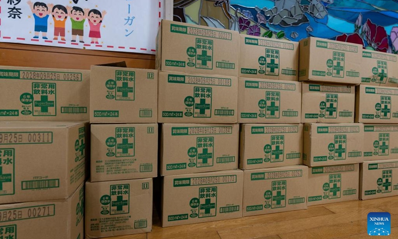 This photo taken on Jan. 2, 2024 shows packs of drinking water for quake-affected people at a primary school in Shika, Ishikawa prefecture, Japan. The death toll has risen to 48 in the central Japanese prefecture of Ishikawa as of 3:30 p.m. local time after a series of powerful earthquakes hit the area in central Japan and the vicinity, national broadcaster NHK reported on Tuesday. (Photo: Xinhua)