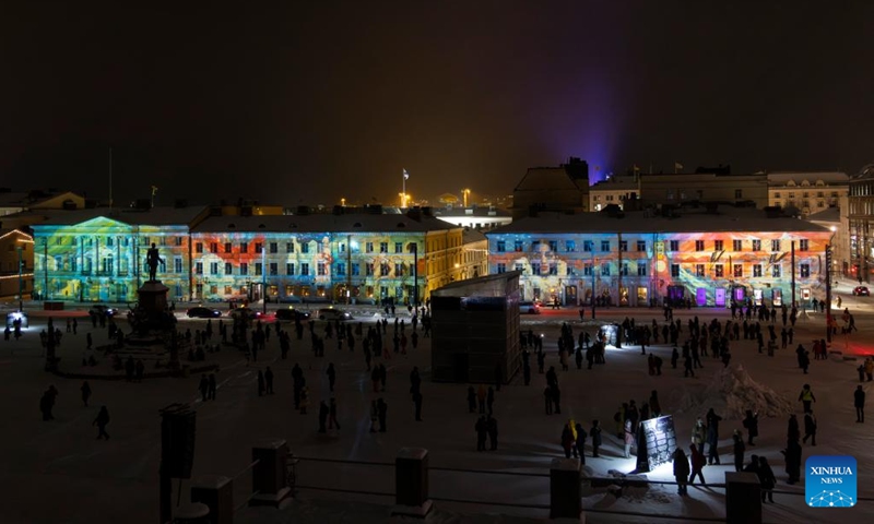 Buildings in Senate Square are illuminated during the Lux Helsinki light festival in Helsinki, Finland, on Jan. 3, 2024. Lux Helsinki is an annual festival of light art held here in early January.(Photo: Xinhua)