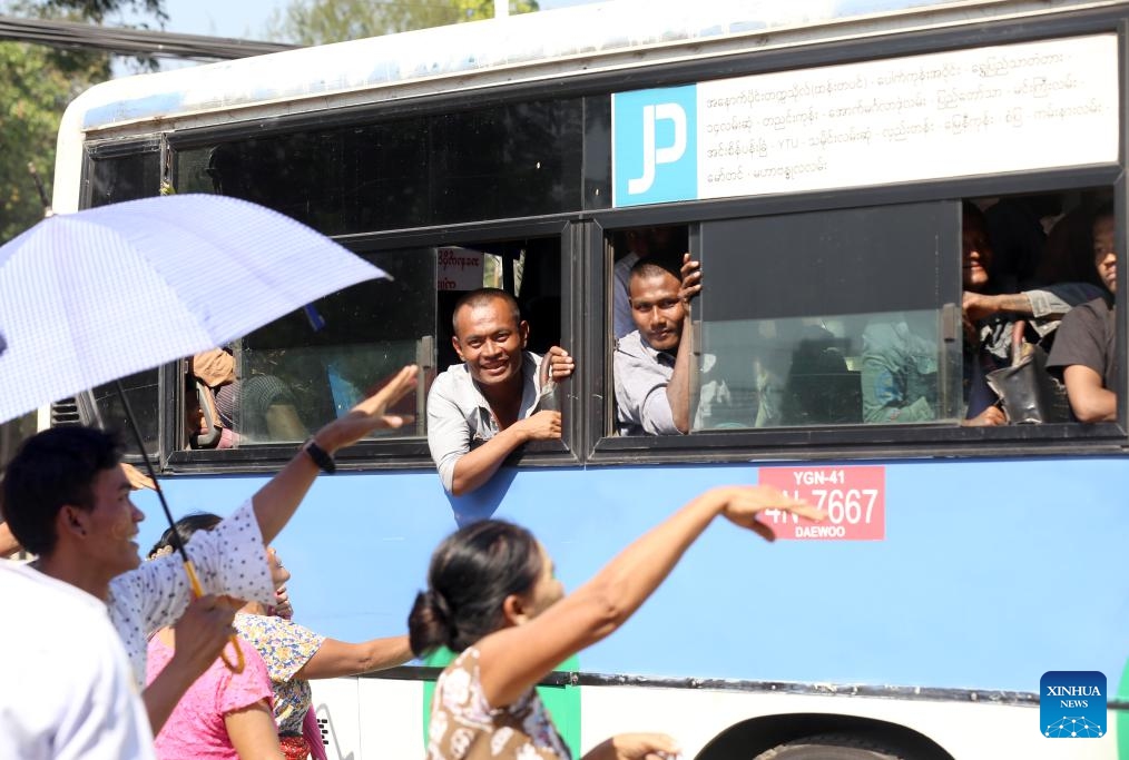 A bus carrying prisoners granted amnesty on Myanmar's 76th Anniversary of Independence Day departs from the Insein Prison in Yangon, Myanmar, Jan. 4, 2024. Myanmar's State Administration Council on Thursday pardoned over 9,000 prisoners to mark the country's 76th Anniversary of Independence Day.(Photo: Xinhua)